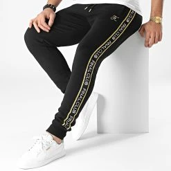 Pantalon Jogging Luxury Edition A Bandes Avec Broderie Or 786 Noir de Final Club - Confort et Élégance -Final Club Soldes final club 285223 FINAL 786 20211209T145057 04